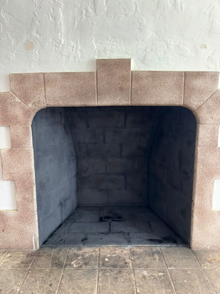 Clean fireplace chimney interior after professional chimney cleaning service in California