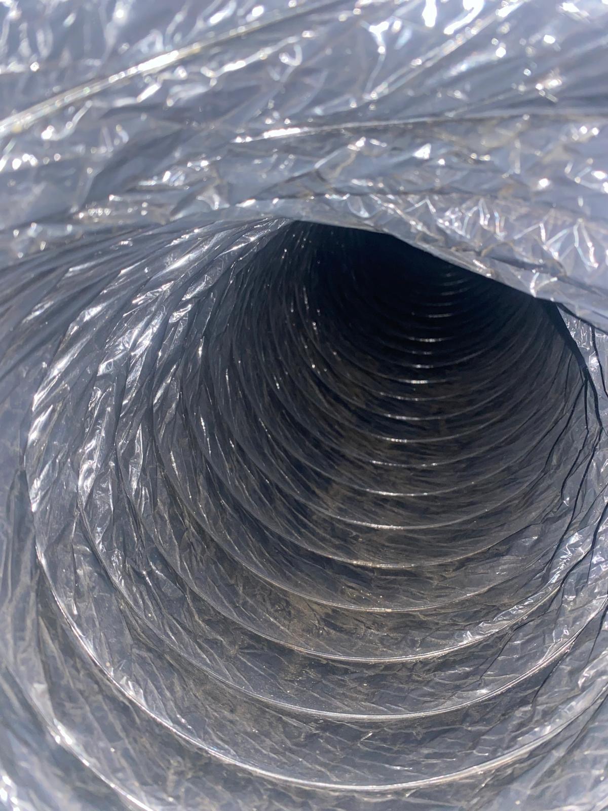 Before-and-after photo documentation of California air duct cleaning by California Airduct Pros — visible removal of years of accumulated buildup, with written 100 percent satisfaction guarantee