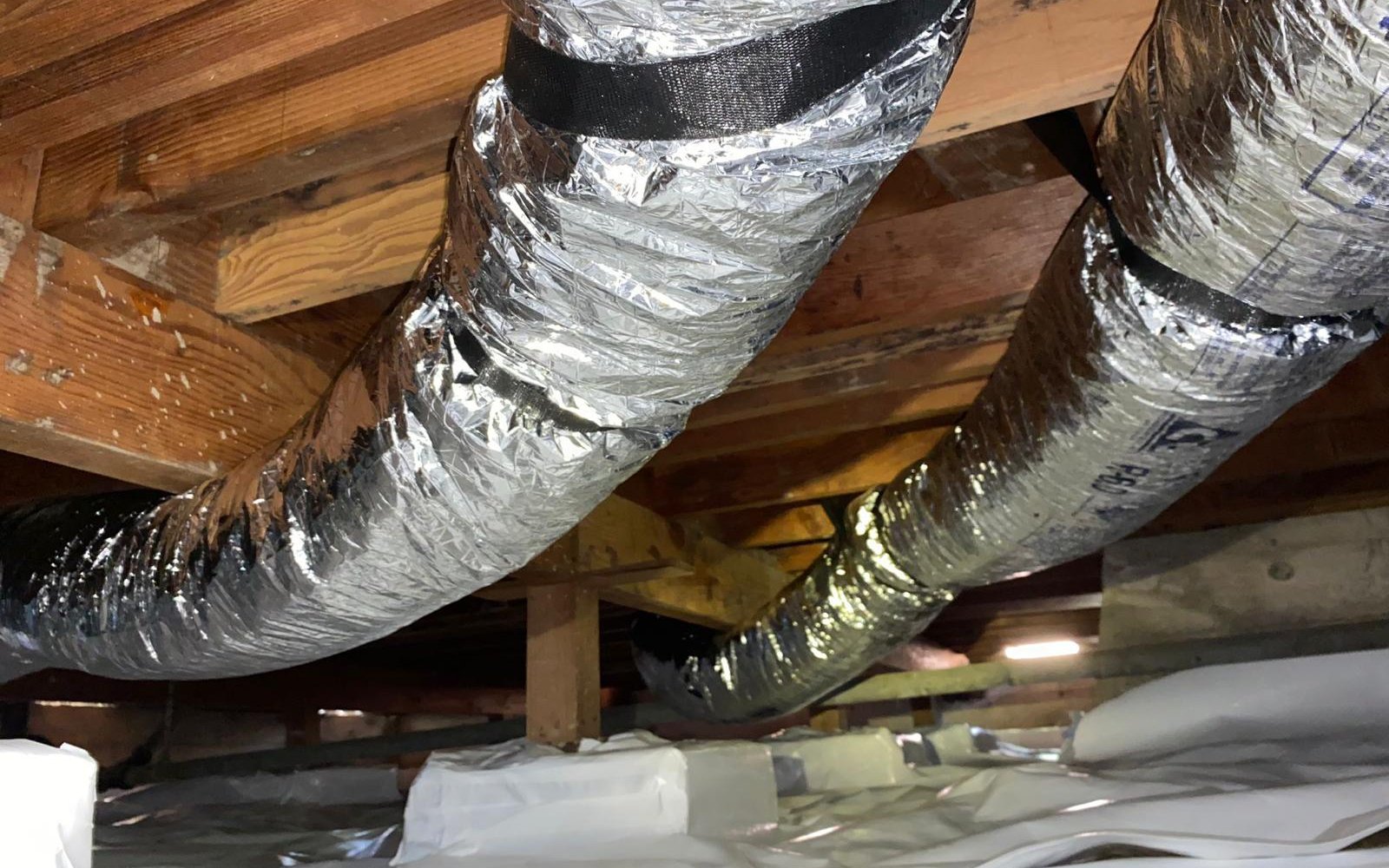 Newly installed California air duct system by California Airduct Pros — complete R-8 insulated flex duct replacement properly supported and code-compliant